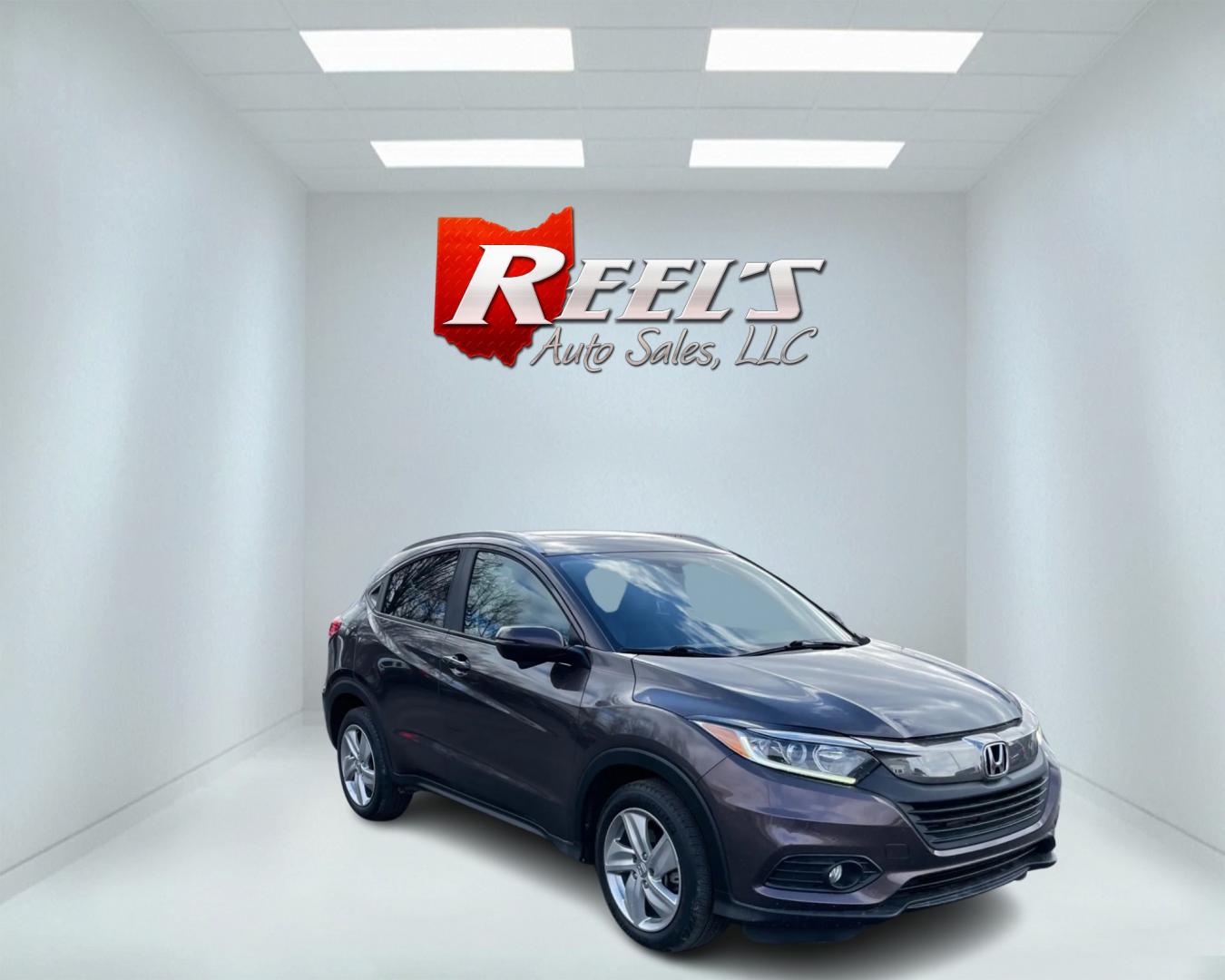 2019 Purple /Black Honda HR-V EX AWD (3CZRU6H54KM) with an 1.8L I4 DOHC 16V engine, Automatic transmission, located at 11115 Chardon Rd. , Chardon, OH, 44024, (440) 214-9705, 41.580246, -81.241943 - Photo#2